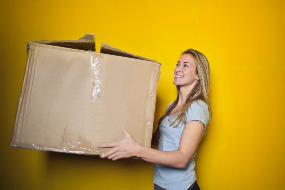 lady-carrying-box-mgd-1200x800